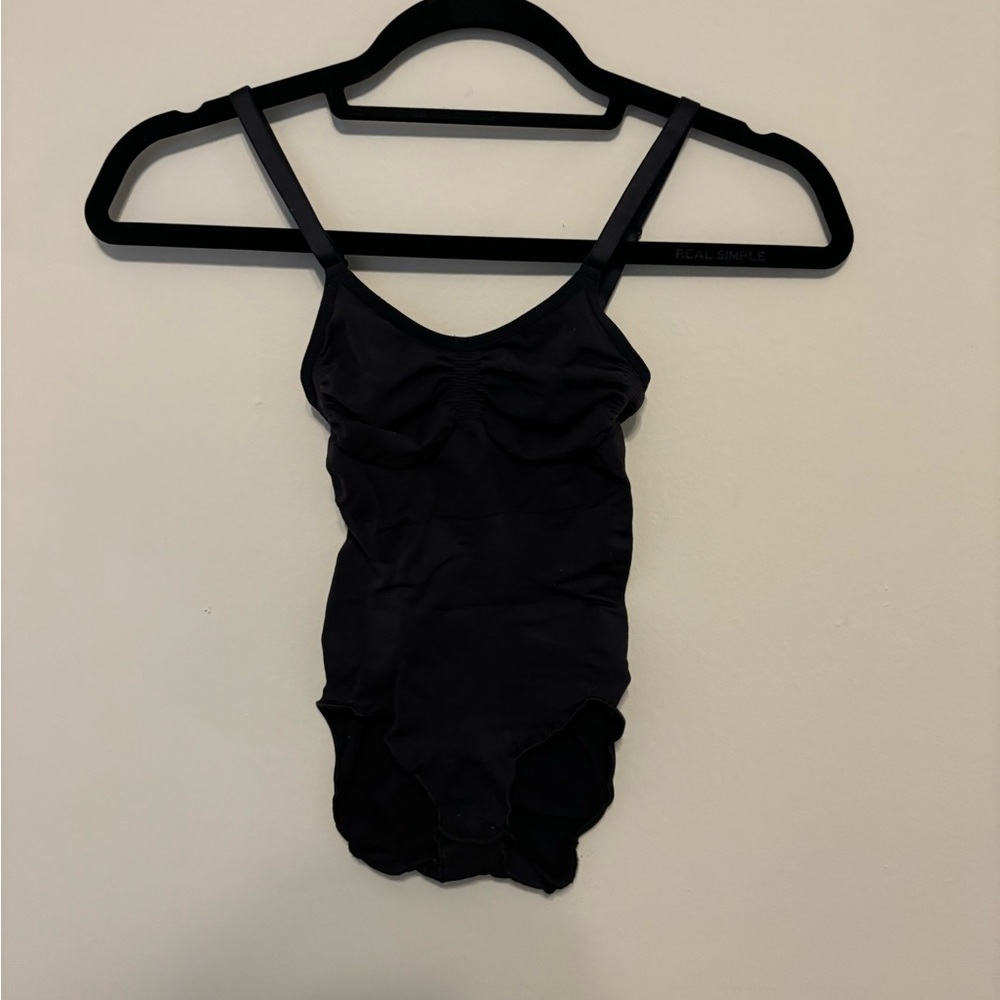 Skims shape wear body suit.